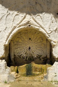 France, Dordogne, Brantome, Saint Pierre benedictine abbey, Saint Sicaire fountain carved into the cliff
