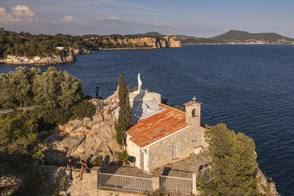 France, Var, the Rade (Roadstead) of Toulon, Cap Brun, the chapel of Notre Dame du Cap Falcon which overlooking the harbor of the small houses of Mejean cove (aerial view)
