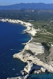 France, Corse du Sud, Natural Reserve of Bouches de Bonifacio, limestone cliffs (aerial view)