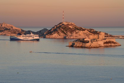 France, Bouches du Rhone, Marseille, Calanques National Park, archipelago of Frioul islands, La Meridionale Ferry arriving from Corsica and the Chateau d'If in the foreground
