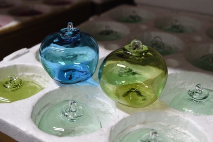 France, Moselle, Meisenthal, Centre international d'Art verrier (CIAV) (international glass centre), apple-shaped glass Christmas ball