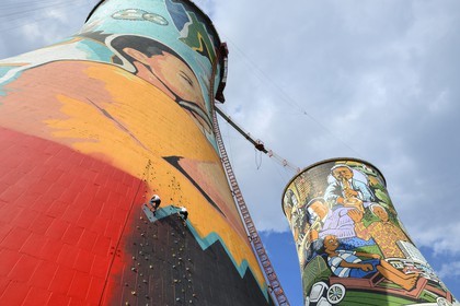 South Africa, Gauteng Province, Johannesburg, Orlando Towers overlooking the Orlando area of ​​Soweto, climbing wall of the Vertical Adventure Centre on one of the two cooling towers from the Orlando Power Station