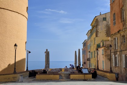 France, Haute Corse, Bastia, the Citadel district of Terra Nova, the palace of the Genoese governors that hosts the Musee d'Histoire de Bastia (Museum of Bastia History) left, Restaurant terrace on the Dungeon place