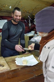 France, Haut Rhin, Strasbourg, Kaysersberg, Tasting of a Munster cheese from Ferme Laurent (organic dairy products) in Freland