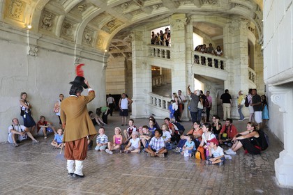 France, Loir et Cher, Loire Valley listed as World Heritage by UNESCO, Chateau de Chambord, guided tour in costume for children in front of the double helix staircase attributed to Leonardo Da Vinci