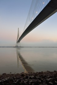 France, between  Calvados and Seine Maritime, the Pont de Normandie (Normandy Bridge) in the mists of dawn, the deck is prestressed concrete except for its central part which is metallic