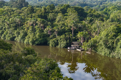 France, French Guiana, Kourou, the carbet (shelter) at Camp Maripas on the banks of the Kourou river (aerial view)