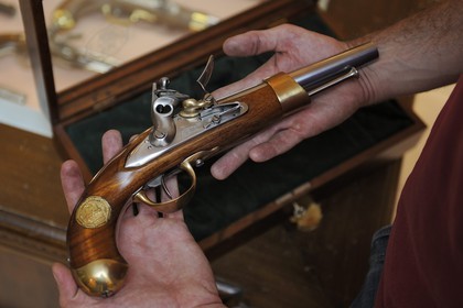 Italy, Lombardy, province of Brescia, Gardone Val Trompia, Davide Pedersoli & C manufacturer specialized in the production of historical muzzleloading guns, pistol of Napoleonic times in the showroom