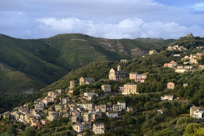 France, Haute Corse, Cap Corse, Rogliano municipality, village of Bettolacce (Bettulace) overlooked by the round Genoese tower della Parocchia, fortified tower of the fifteenth century