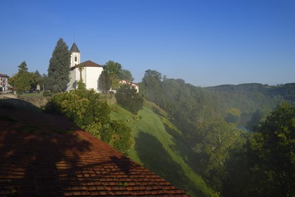 France, Pyrenees Atlantiques, Basque Country, Cambo les Bains, the 17th century Saint-Laurent church and the Nive river