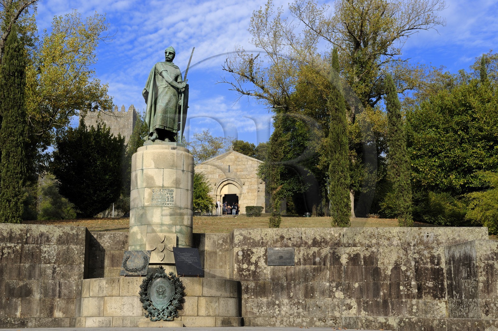 Portugal, Minho region, Guimaraes, town listed as World Heritage by UNESCO, statue of the first Portuguese King Alfonso Henriques in front of the Igreja de Sao Miguel do Castelo ( St Michael of the Castle church)