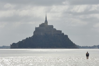 France, Manche, crossing on foot the Bay of Mont Saint Michel, listed as World Heritage by UNESCO
