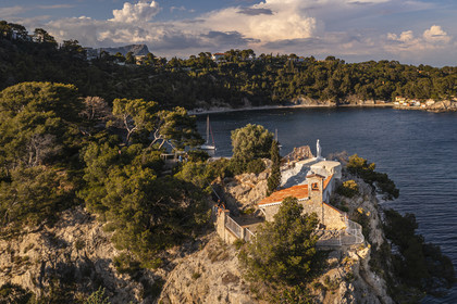 France, Var, the Rade (Roadstead) of Toulon, Cap Brun, the chapel of Notre Dame du Cap Falcon which overlooking the harbor of the small houses of Mejean cove (aerial view)