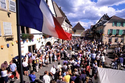 France, Haut Rhin, Eguisheim village, labelled Les Plus Beaux Villages de France (The Most Beautiful Villages of France), wine celebration, parade in costumes in the main road