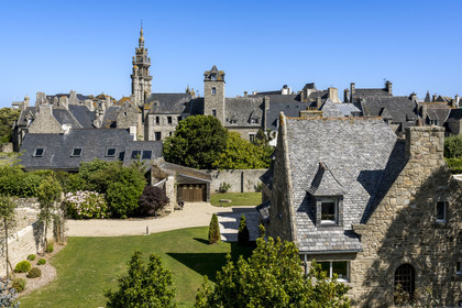 France, Finistère, Roscoff, the bell tower of the Notre-Dame de Croaz Batz church and the back of old shipowners' houses including that of the James brothers built at the end of the 16th century