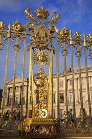 France, Yvelines, Chateau de Versailles, listed as World Heritage by UNESCO, detail of the Royal Gate drawn by Mansart (restored in June 2008) which separating the Royal Courtyard