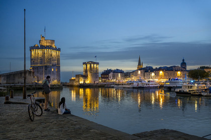 France, Charente Maritime, La Rochelle, the Old Port, Tour Saint Nicolas and Tour de la Chaine protect the entrance to the Old Port, the tour de la Lanterne in the background