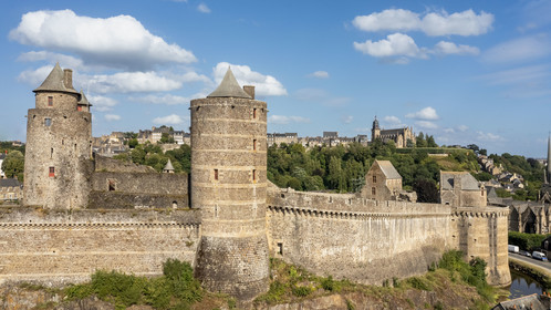 France, Ille-et-Vilaine, Fougeres, 12th century fortified castle and the Saint-Léonard church in the background (aerial view)