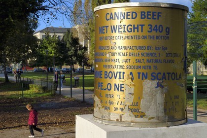 Bosnia and Herzegovina, Sarajevo, a monument was erected after the war to send a sarcastic thank you to the world for its help, one of the most common features of humanitarian aid during wartime was a yellow can of Icar ground beef that locals say “not even dogs would consume”