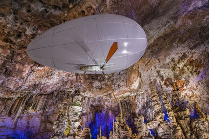France, Gard, Mejannes-le-Clap, grotte de La Salamandre (Salamander cave), discovery of the cave in Aéroplume®, an individual dirigible balloon inflated with helium which allows you to fly away by flapping your wings