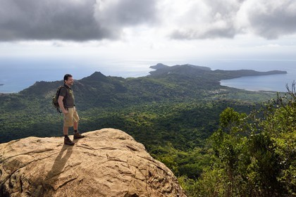 France, Mayotte island (French overseas department), Grande-Terre, Southern Crete Forest Reserve (Reserve Forestiere des Cretes du Sud), hiker at the summit of Mount Choungui (594 meters)