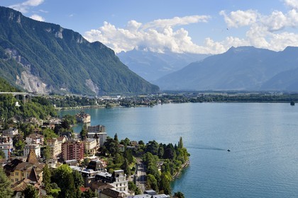 Switzerland, Canton of Vaud, Montreux in the foreground and the Chillon castle on the shores of Lake Geneva (Lac Leman) at Veytaux