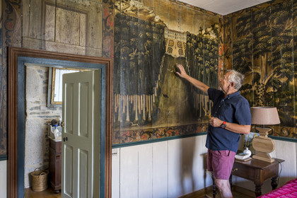 France, Finistère, Roscoff, shipowner's house called la Porte Noire (the Black Gate) built at the end of the 16th century by the James brothers and belonging today to Christian Kulig, master bedroom with murals on wooden partitions  representing Roscoff in the 18th century