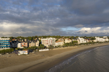 France, Charente-Maritime, Royan, seafront and Grande-Conche beach with the small building (in orange) La Perrinière from the 1950s designed by the architects M. Barnier and J. Daugrois (aerial view)