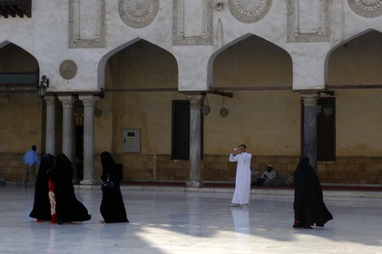 Egypt, Cairo, El-Azhar mosque, a man taking a picture of his family