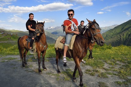 Georgia, Kakheti, Tusheti National Park, Georgian horsemen on the Bochorna trail (2345 meters) the highest inhabited village in the country and one of the highest in Europe