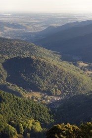 France, Haut Rhin, the village of Wasserbourg at the foot of the Petit Ballon in the Vallon du Krebsbach and the plain of Alsace in the background
