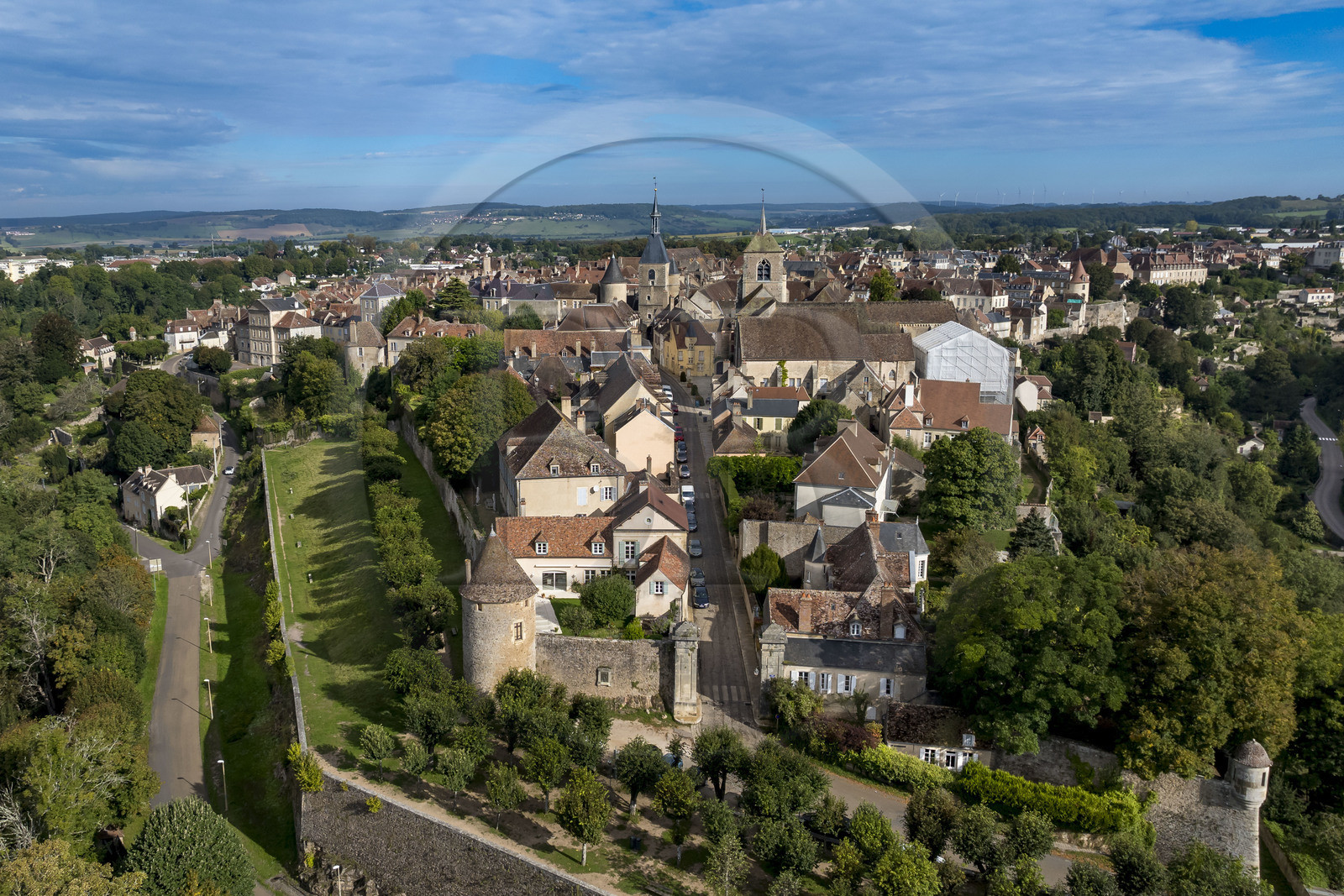 France, Yonne, regional natural park of Morvan, Avallon, the ramparts of the old town, the Clock Tower and the collegiate church of Saint-Lazare in the background (aerial view)