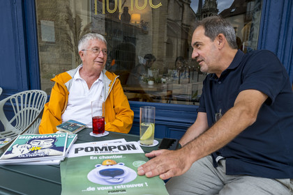 France, Cote d'Or, Dijon, area listed as World Heritage by UNESCO, terrace of the Bar Nuage at Place Bossuet, journalist Gérard Bouchu, editor-in-chief of Pompon and Bingbang magazines, two offbeat perspectives on the cultural and gastronomic life of Dijon and its region, with his editor Richard Patouillet