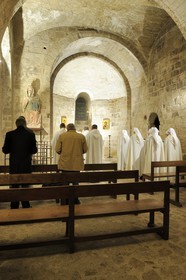 France, Manche, the abbey of Mont Saint Michel, listed as World Heritage by UNESCO, Abbey Church, brothers and sisters of the Monastic Fraternities of Jerusalem, the Lauds in the chapel of Trentes Cierges