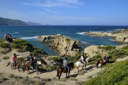 France, Haute Corse, Nebbio, Agriates Desert, Peraiola Cove, riders on the East of Ostriconi beach