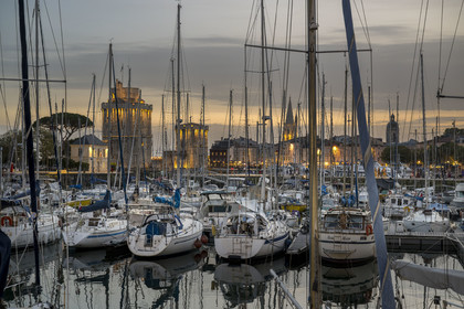France, Charente Maritime, La Rochelle, the Old Port, Tour Saint Nicolas and Tour de la Chaine protect the entrance to the Old Port, the tour de la Lanterne in the background