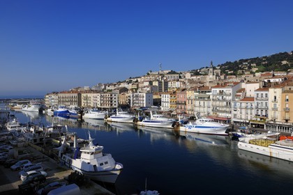 France, Herault, Sete, canal Royal (Royal Canal), tuna boat docked at the foot of Mont Saint Clair and the St. Louis decanal church