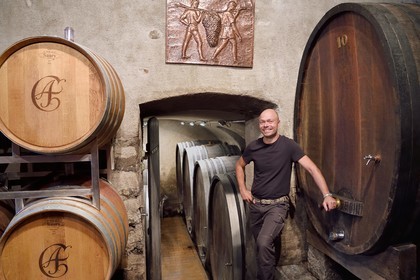 Switzerland, Canton of Vaud, Aigle, Marc Emery in the cellar of Grands Vins d'Aigle Alain Emery