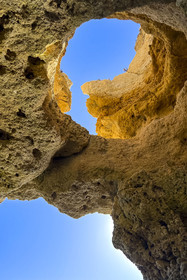 Portugal, Algarve, Lagos, Kayak tour at the foot of the steep cliffs of Ponta da Piedade