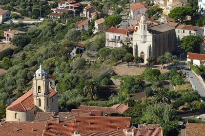 France, Corse du Sud, Cargese, the catholic church (latin rite)  in the foreground and the Greek catholic church of Saint Spyridon (Eastern rite or Uniate) in the background