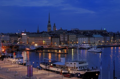 Sweden, Stockholm, Gamla Stan island (old town) and Stadsgarden quay by night