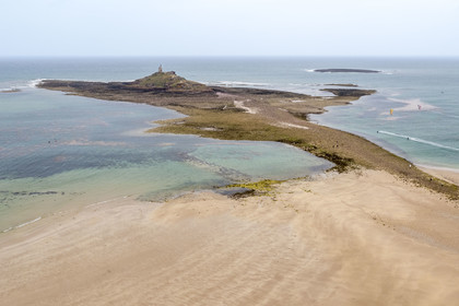 France, Cotes d'Armor, Grand Site de France Cap d'Erquy - Cap Frehel, Erquy, the Saint-Michel islet topped by the Saint-Michel chapel accessible on foot at low tide via a tombolo (aerial view)