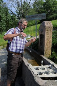 Germany, Black Forest, Schwarzwald, Baden-Württemberg, Sasbachwalden, Schnapsbrunnen, schnaps (Schnapps) fountain, self service eau de vie (a strong alcolholic drink) in a fountain