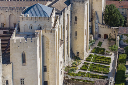 France, Vaucluse, Avignon, Palais des Papes (Palace of the Popes) listed as World heritage by UNESCO, the Wardrobe Tower directly attached to the south of the Tower of Angels or Pope's Tower above the papal garden (aerial view)