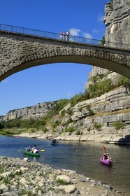 France, Ardeche, Balazuc, labelled Les Plus Beaux Villages de France (The Most Beautiful Villages of France), kayaks going down the Ardeche River