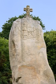 France, Cotes-d'Armor, Cote de Granit Rose (the Pink Granite coast), Pleumeur Bodou, menhir of Saint Duzec, carved during its christianisation in the 17th century