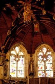 France, Côtes d'Armor, carved sculptures and hanging keystone of the vault of the church of Loc Envel