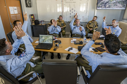 France, Bouches du Rhone, Salon de Provence, air base 701, base of the Patrouille de France (PAF for Patrouille acrobatique de France) of the French Air and Space Force, the music rehearsal, mental visualization of the flight, under the direction of commander and leader Julien Decorte (left) during the briefing in the premises of the Patrouille de France