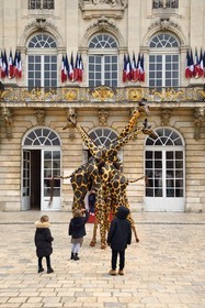 France, Meurthe-et-Moselle, Nancy, place Stanislas (former Place Royale) during the feast of Saint-Nicolas, listed as World Heritage by UNESCO, giraffes from the Teatro Pavana company