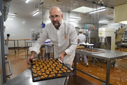 France, Bas Rhin, Munlhdolseim, pastry chocolatier Thierry Mulhaupt in his workshop, salty bredele (biscuits) platter
